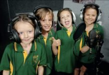 Students perform new song