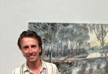 Artist back home to work