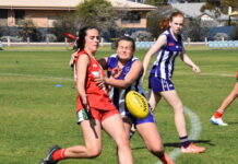 Junior girls in action during grand final