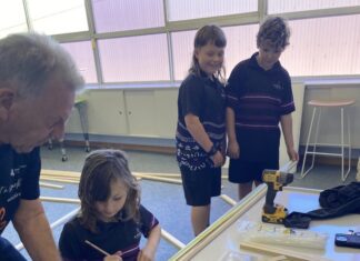 School students give to elderly